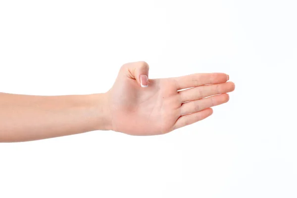 Weibliche Hand zur Seite ausgestreckt und zeigt die Handfläche deiner isolierten Hand auf weißem Hintergrund — Stockfoto