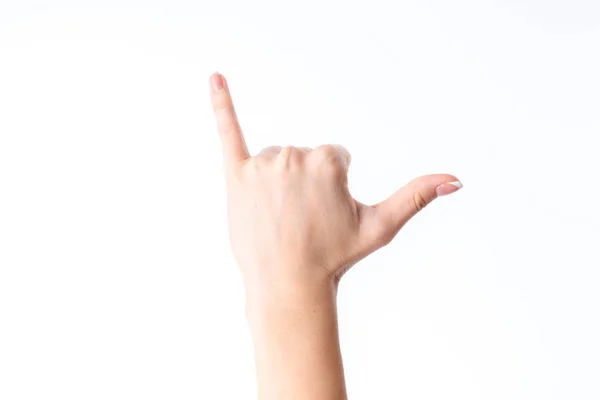 Γυναίκα δείχνει την κίνηση με το χέρι που επεκτείνεται μέχρι το μικρό δάχτυλο και τον αντίχειρα είναι απομονωμένα σε λευκό φόντο — Φωτογραφία Αρχείου