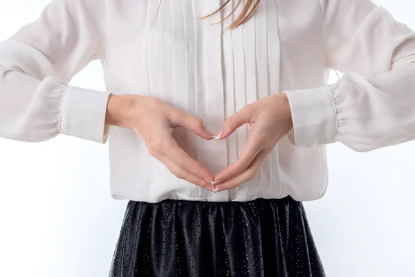 Dziewczyna trzyma dwie ręce ukochaną na białym tle — Zdjęcie stockowe
