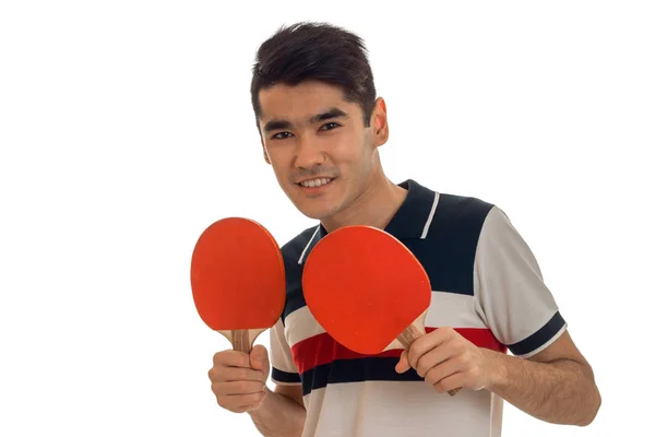 Retrato de desportista alegre praticando um ping-pong e sorrindo na câmera isolada no fundo branco — Fotografia de Stock