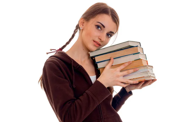 Junges Mädchen-Teenager hält viele Bücher isoliert auf weißem Hintergrund — Stockfoto