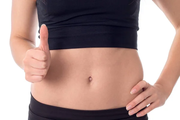 Bauch junge schlanke Mädchen, die eine Nahaufnahme der Klasse zeigt — Stockfoto