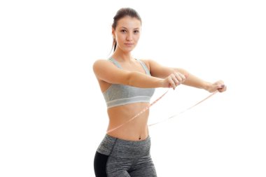 Güzellik genç kızın beline teyp ve kameraya bakarak ölçmek