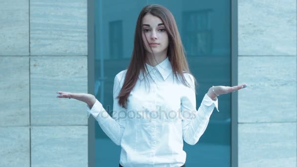 Cute girl waving her head to the side shows no gesture — Stock Video