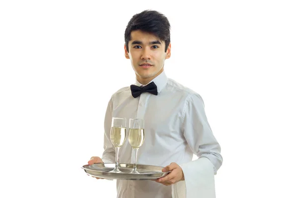 Amazing piękny kelner taca z kieliszków wina na białym tle na białym tle — Zdjęcie stockowe