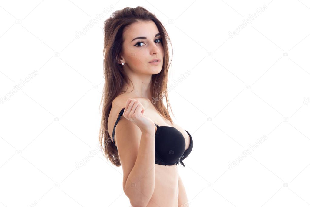 horizontal portrait hot beautiful brunette in Bra is isolated on a white background