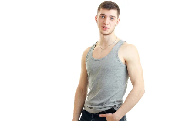 Horizontal portrait of beautiful sexual guy in the gray shirt — Stock Photo, Image