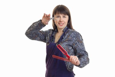 Kameraya gülümseyen ellerde araçları ile önlük stilist