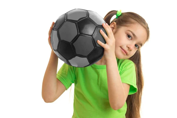 Little girl playing football in soccer ball — Stock Photo, Image