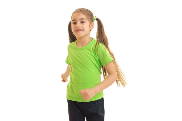 Beautiful little girl with tails runs in Studio — Stock Photo, Image