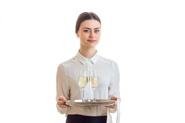 Cute young waitress in uniform with trey — Stock Photo, Image