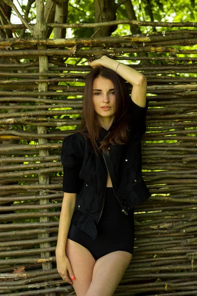 Beautiful sensual girl in black dress — Stock Photo, Image