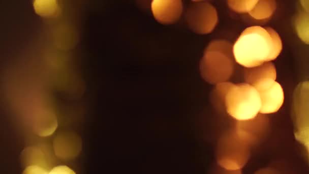 Gouden bokeh achtergrond — Stockvideo