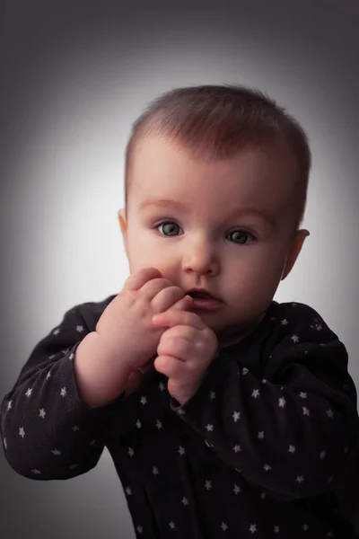 Cute little child posing in studio — Stock Photo, Image