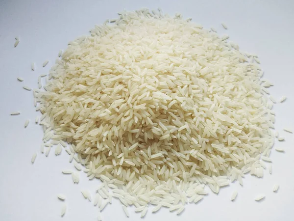Jasmine rice on white background , close up — Stock Photo, Image