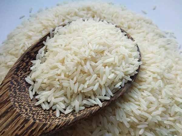 Jasmine rice on white background , close up — Stock Photo, Image
