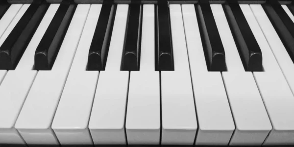 Grand Piano keyboard background close up Stock Picture