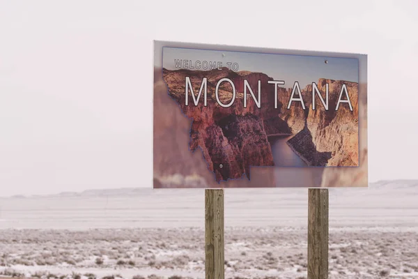 Bem-vindo ao Montana Winter State Boundary Highway Sign — Fotografia de Stock