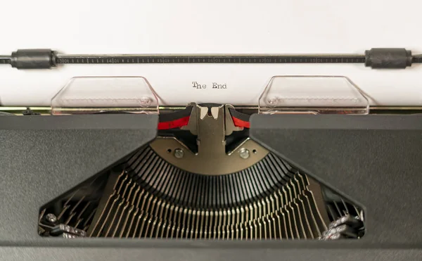 White Paper in Old Typewriter Text Says The End — Stock Photo, Image