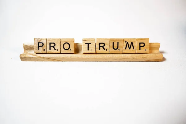 Scrabble Tray and Block Letters Say Pro Trump on White — Stock Photo, Image