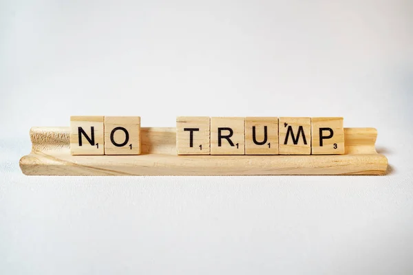 Scrabble Tray and Block Letters Say No Trump on White — Stock Photo, Image