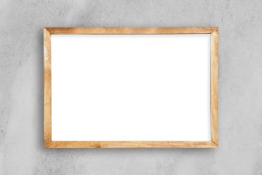 Boş resim çerçevesi üzerinde beyaz bir beton duvar