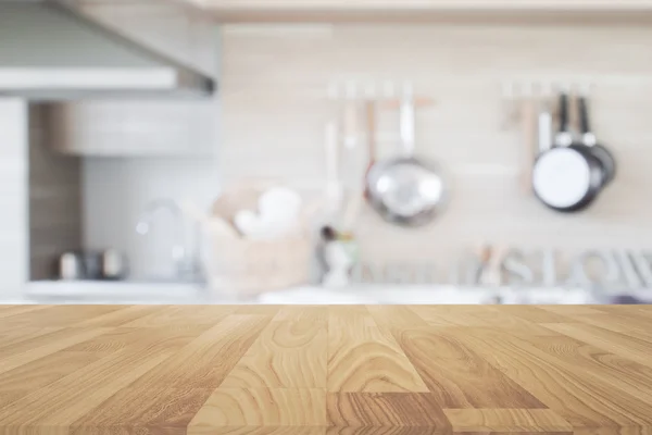 Wood table top with blur kitchen background , empty wooden table