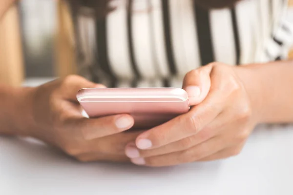 Close up of a woman using mobile smart phone — Stock Photo, Image