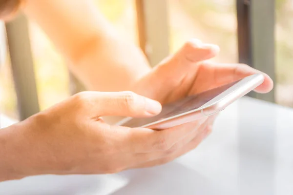 Close up of a woman using mobile smart phone — Stock Photo, Image