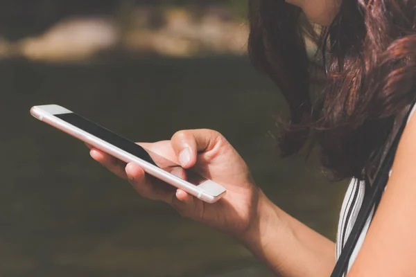 Close up of a woman using mobile smart phone — Stock Photo, Image