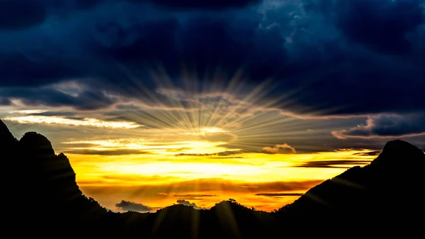 Beautiful landscape , silhouette mountains and beautiful sky with sunray — Stock Photo, Image