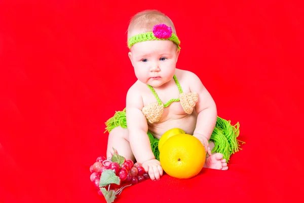 Portrait of adorable cute newborn little baby girl dressed Papuan — Stock Photo, Image