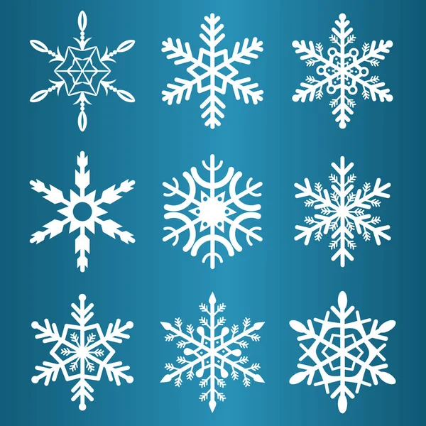 Snowflakes winter season vector christmas snow holiday cold ice flake symbol illustration — Stock Vector