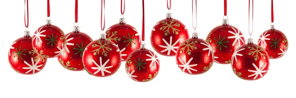 Christmas baubles in a row isolated on white background — Stock Photo, Image