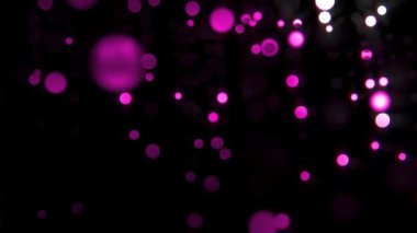 Mor violett glamour ışık bokeh parçacıklar siyah gecede düşen hareket, arka plan döngüsü olarak kullanılabilir