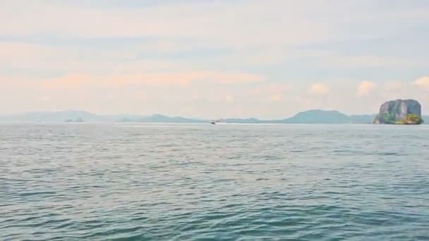 Tranquil Azure Sea against Cliffy Islands Sky Pink Clouds — Stock Video