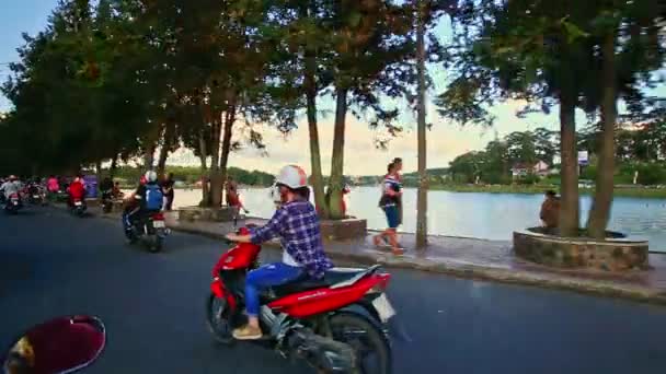 Scooters driving along traffic — Stock Video