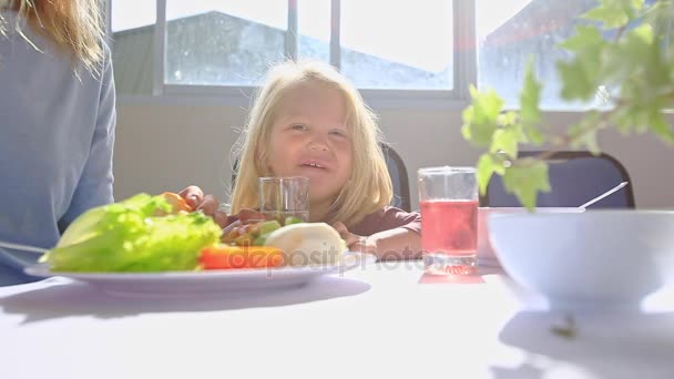 Little girl having breakfast — Stock Video