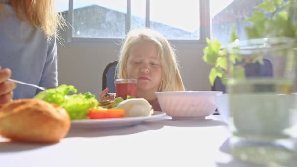 Little girl having breakfast — Stock Video