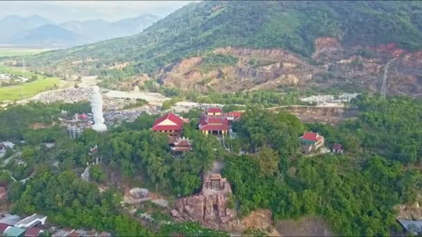 Buddhist temple against forestry landscape with Buddha statue — Stock Video