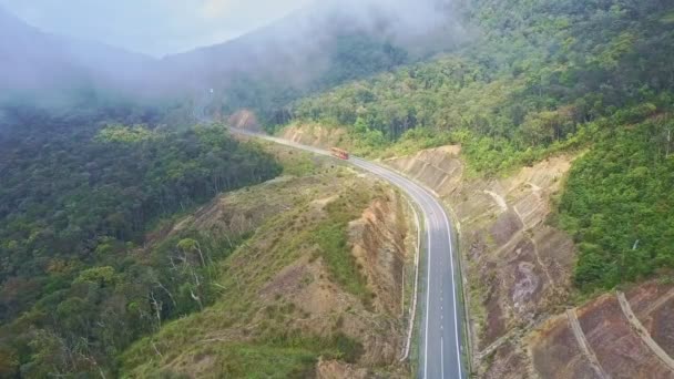 Mountain road among surrounding tropical woods — Stock Video