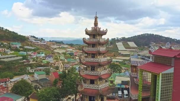 Pagoda in temple complex among city — Stock Video