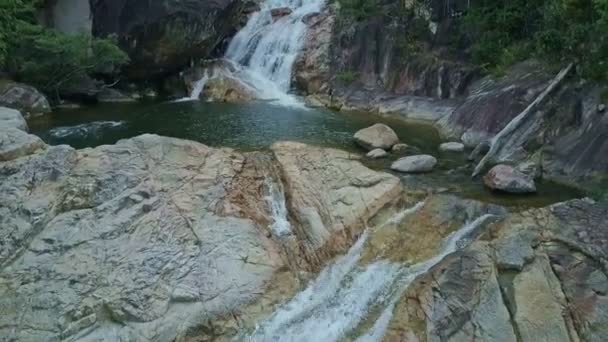 Small waterfall in mountain forest — Stock Video