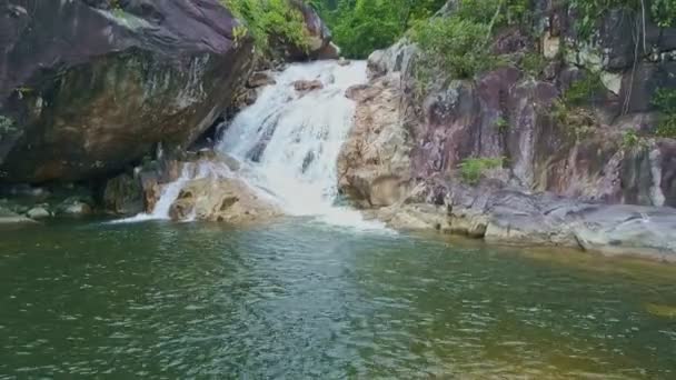 Small waterfall in mountain forest — Stock Video