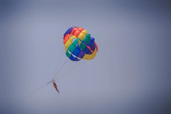 Brave Man Flights High Clear Blue Sky Bright Colorful Parachute — Stock Photo, Image