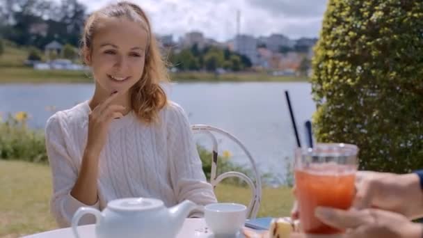 Closeup Waiter Brings Cocktail Young Girl Takes Glass Drink Cafe — Stock Video