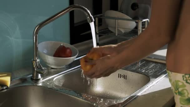 Closeup Girl Takes Fresh Yellow Pepper Soup Plate Wash Water — Stock Video