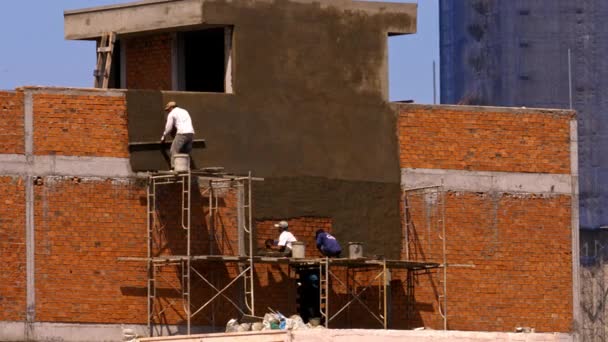 Time Lapse Professional Asian Workers Fill Red Brick Building Cement — Stock Video