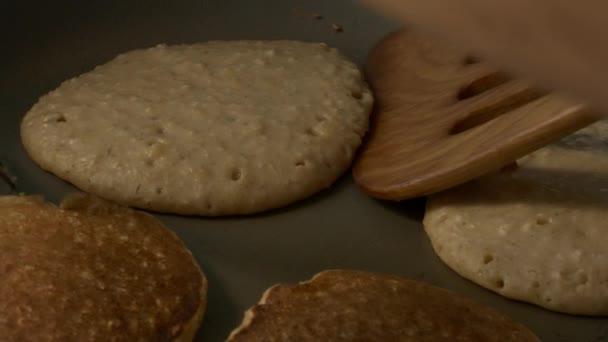 Macro Girl Hands Turn Sweet Oat Pancakes Wooden Spatula Steel — Stock Video