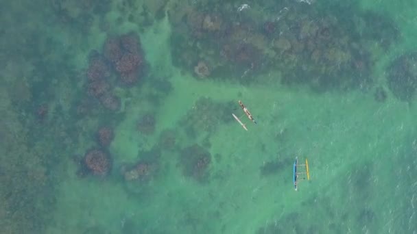 Little boats sail on clear azure ocean aerial view — Stock Video